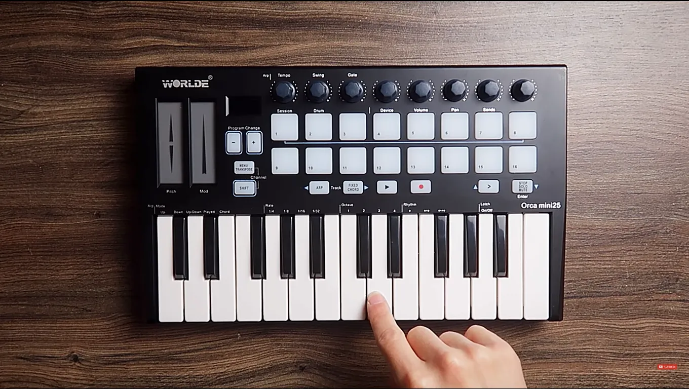 WORLDE Orca Mini 25 compact MIDI keyboard, pads and controls.