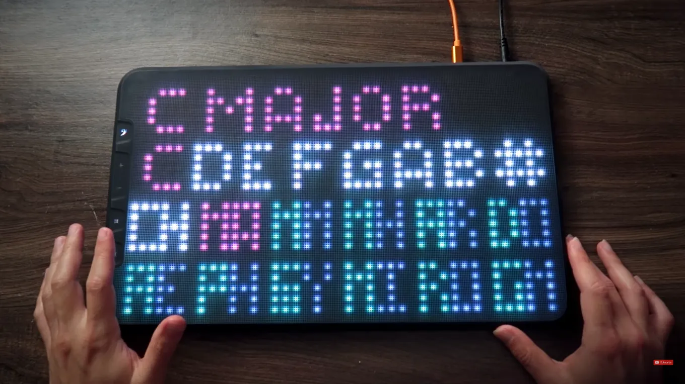 ERAE Touch surface displaying a custom illuminated control layout.