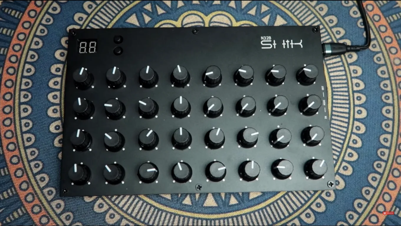 Front view of the SHIK N32B 32-knob controller panel.